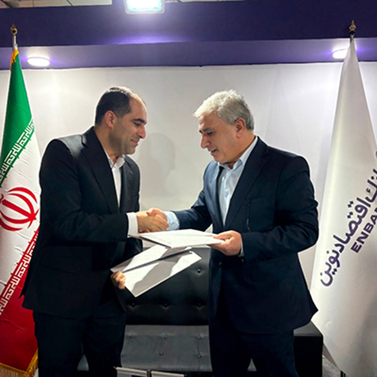 کیش اکسپو؛ امضای تفاهم‌نامه همکاری بانک اقتصادنوین و گروه صنعتی ماموت