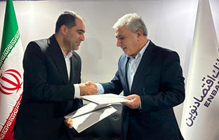 کیش اکسپو؛ امضای تفاهم‌نامه همکاری بانک اقتصادنوین و گروه صنعتی ماموت