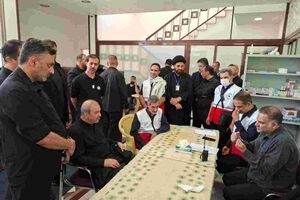 بازدید سفیر جمهوری اسلامی ایران در بغداد از غرفه بیمه ایران در کنسولگری ایران در کربلا در روز اربعین