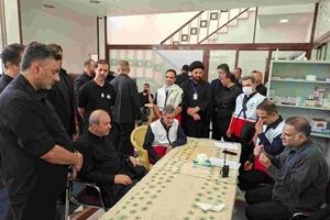 بازدید سفیر جمهوری اسلامی ایران در بغداد از غرفه بیمه ایران در کنسولگری ایران در کربلا در روز اربعین