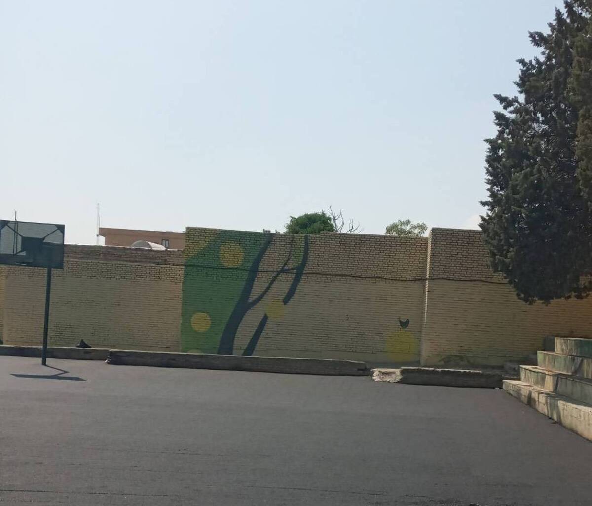 با پخش ۶۰ تن آسفالت ۵۰۰مترمربع از حیاط مدرسه کنی آسفالت شد